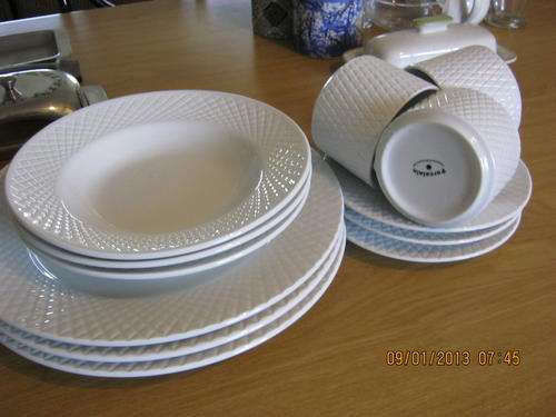 Set of white dinnerware