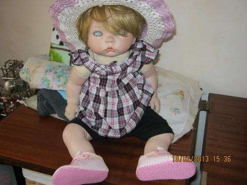 Porcelain doll 23"