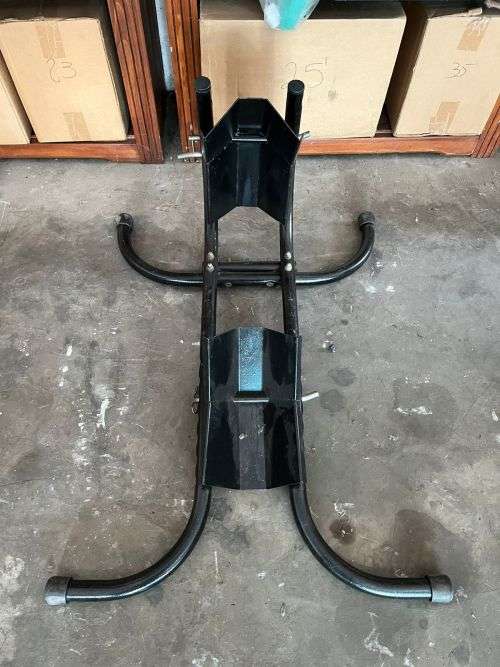 Motorcycle front wheel paddock