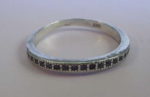 Solid sterling silver half eternity band ring.