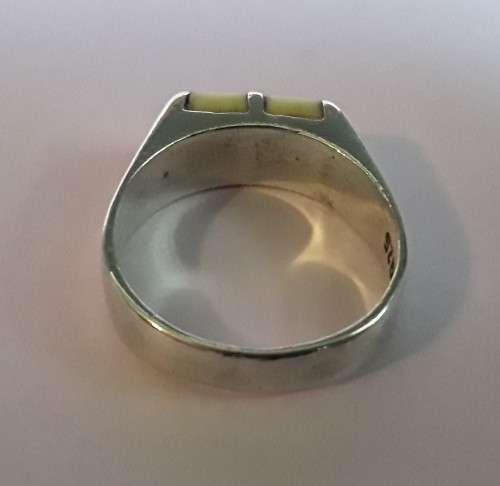Solid sterling silver ring with lovely cream coloured stones
