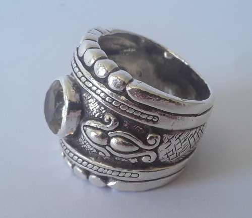 Solid sterling silver wide band ring with faceted citrine coloured stone.  Size: O.  Weight: 13.6g