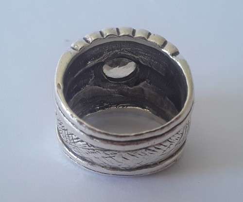 Solid sterling silver wide band ring with faceted citrine coloured stone.  Size: O.  Weight: 13.6g