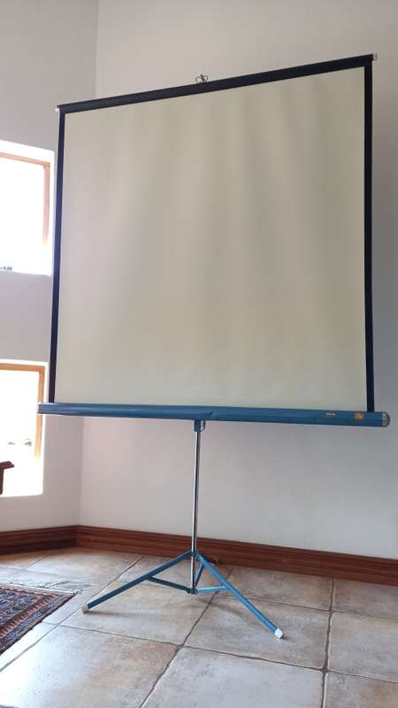 Projector screen for films, slides or for power point presentations.