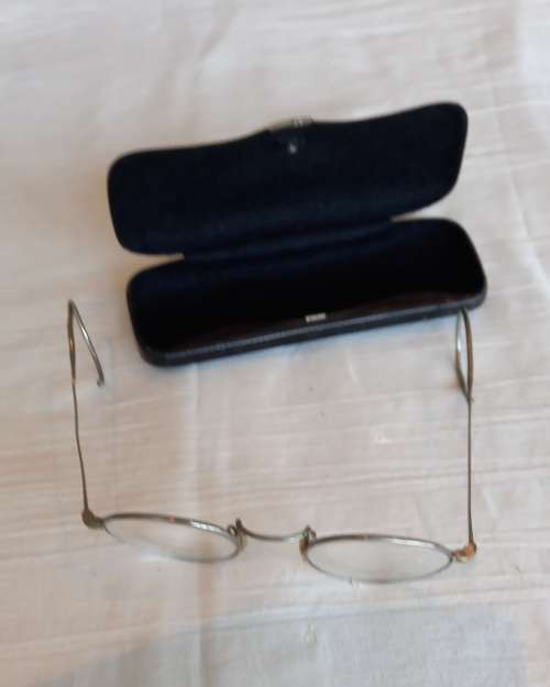 Antique pair of Granny glasses in metal frame, with black metal box.