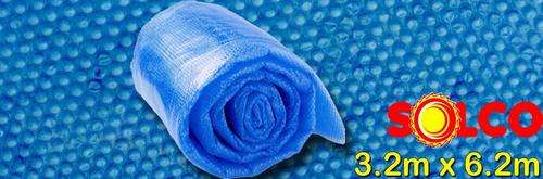 Solco pool cover and fully wetted pool heating solar panels