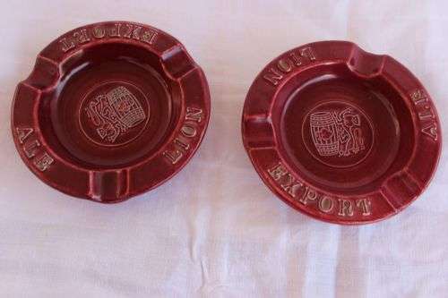TWO LUCIA WARE ASHTRAYS  LION EXPORT ALE
