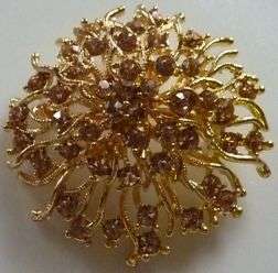 BEAUTIFUL GOLD PLATED BROOCH.