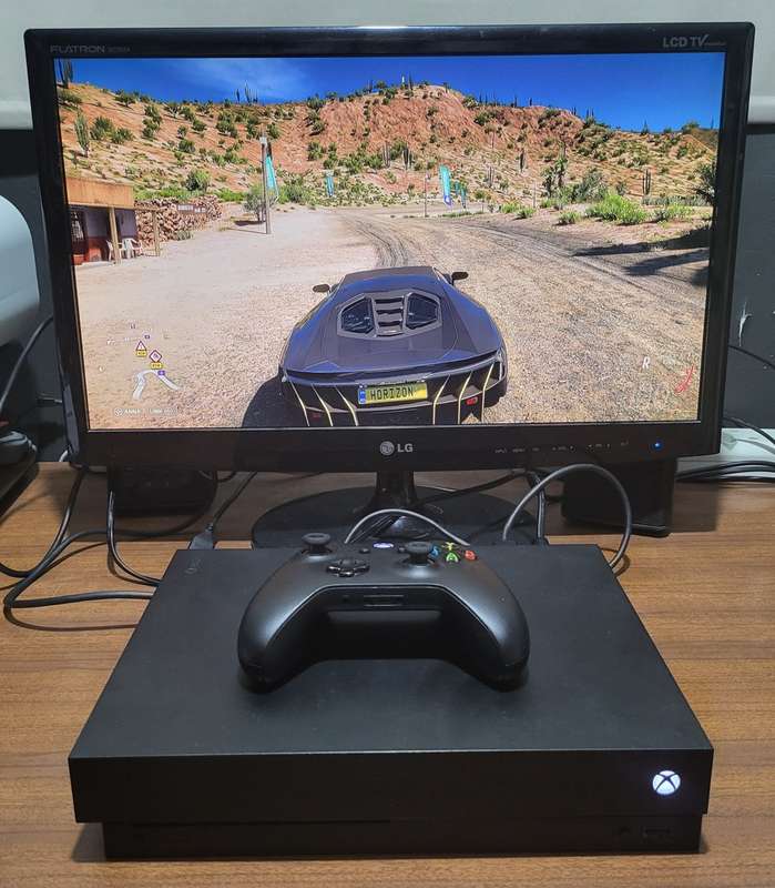 Xbox One X Console With Cables, 1 Controller and 6 Games