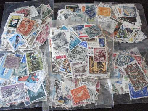WORLD STAMPS 100+ STAMPS PER PACKET !