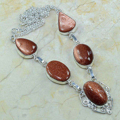 GLAMOROUS SUN SITARA NECKLACE
