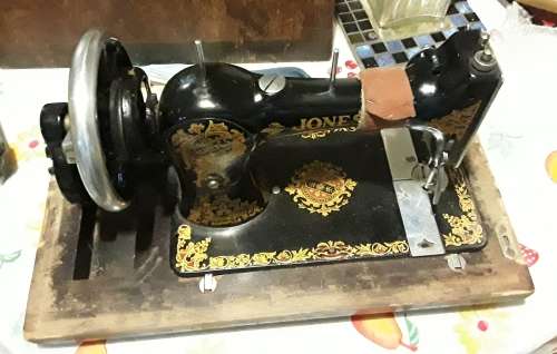 ANTIQUE JONES SEWING MACHINE