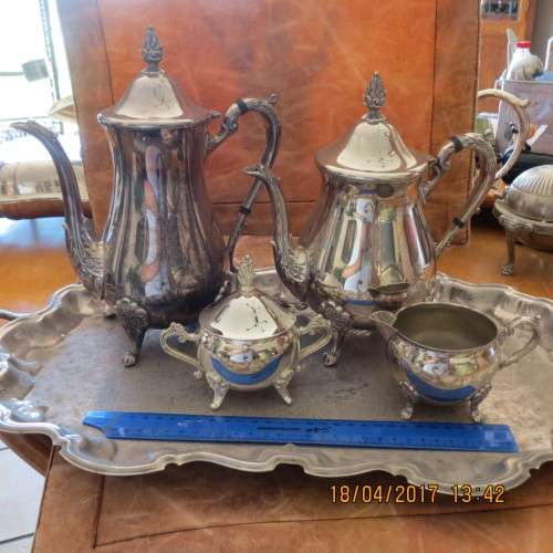 silver plated tea set with water jug on silver plated tray, in decent condition, as per photo