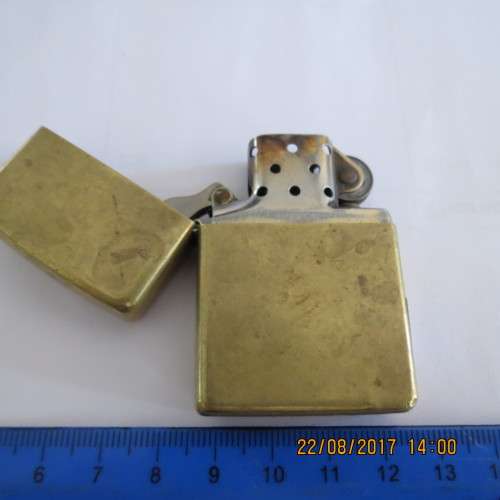 Zippo lighter marked solid brass, as per photo