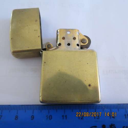 Zippo lighter marked solid brass, as per photo