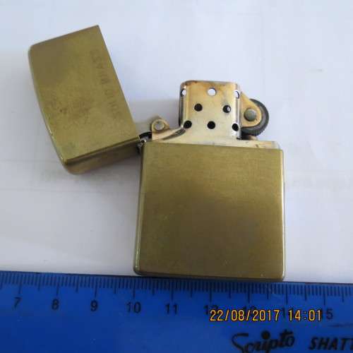 Zippo lighter marked solid brass, as per photo