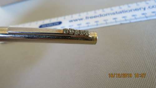gold plated pen, front piece missing, as per photo