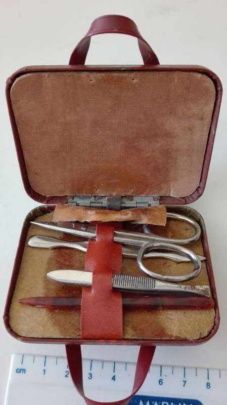 manicure set in travelling case, very attractive, 8.5cm by 6.5cm, as per photo