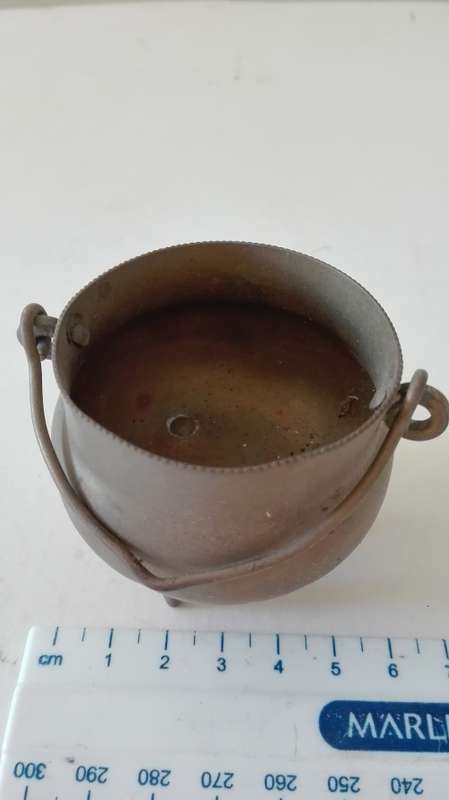 brass African pot, 5.5cm deep and 5.5cm high, as per photo