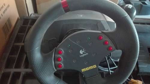 Logitech Momo steering wheel and pedals for computer games,sold as is,no power supply, as per photos