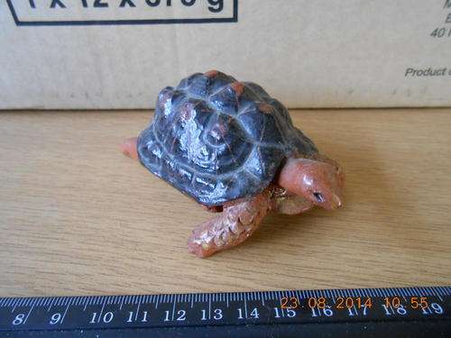 tortoise ornament made out of clay, as per photo