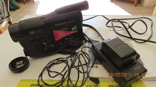 Panasonic RX1, wide lens x14 zoom, VHS, video camara with battery and charger,as per photo