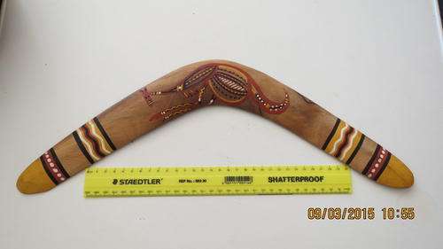 boomerang with sticker on back Queensland Aboriginal creations, as per photo