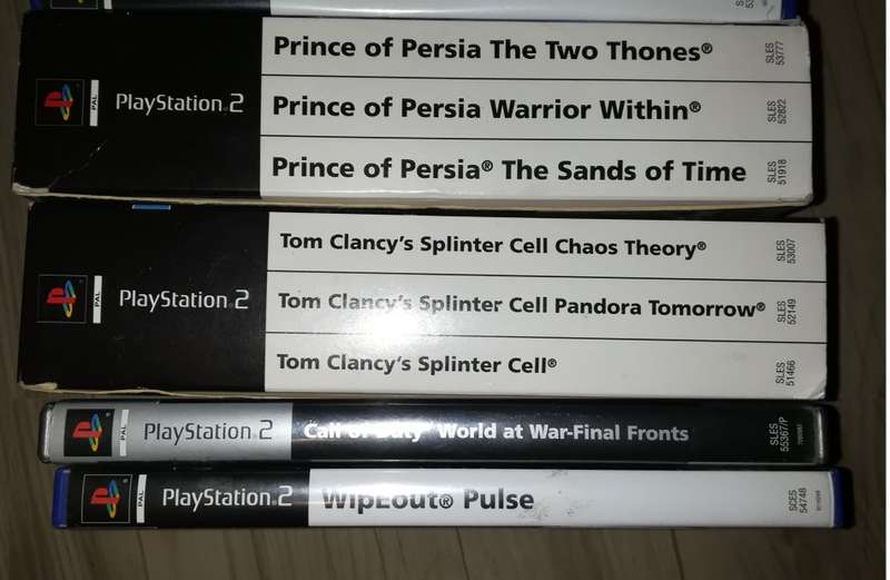 Original Sony Playstation 2 + 9 Games + 1 Controller's + 8MB card -In Good Condition
