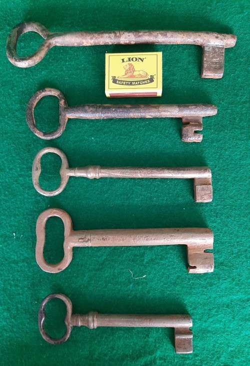 FIVE LARGE ANTIQUE SKELETON KEYS