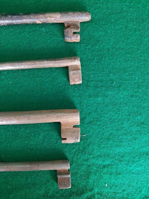 FIVE LARGE ANTIQUE SKELETON KEYS