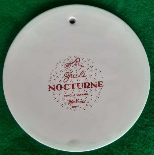 TWO NYMOLLE DENMARK CERAMIC WALL PLATES DESIGNED BY BJORN WIINBLAD