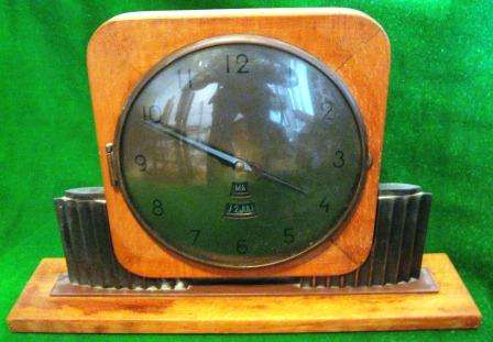ART DECO WOODEN AND BRASS MANTEL CLOCK