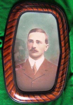 VINTAGE ART DECO PHOTO FRAME WITH ORIGINAL PHOTO OF A GENTLEMAN BEHIND GLASS