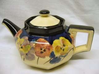 Royal Doulton 'Pansy Design' Teapot . Rd.no. 597.783 ,D.4049. made in England.  circa ?1920's+