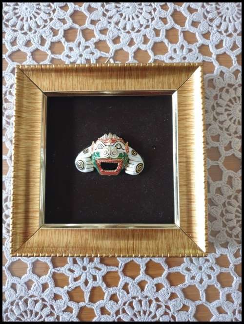 Two Stunning Frames with Metal Masks from Bali