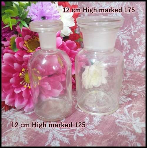 Two Vintage Glass Bottles