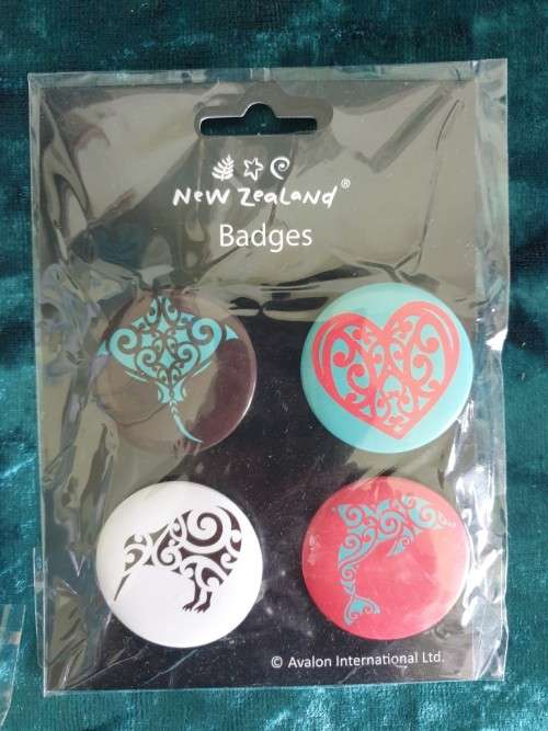 Badges and a  mini Book Keyring