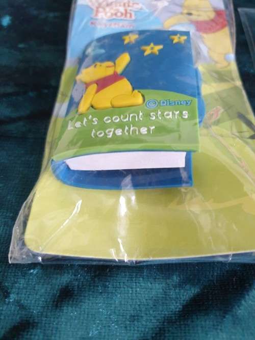 Badges and a  mini Book Keyring