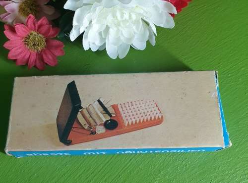 Brush with sewing supplies, retro