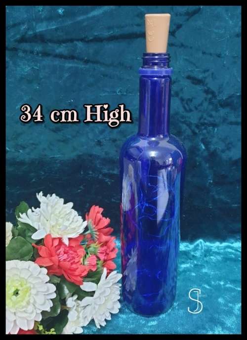 Blue Glass Bottle with Light