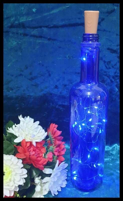 Blue Glass Bottle with Light
