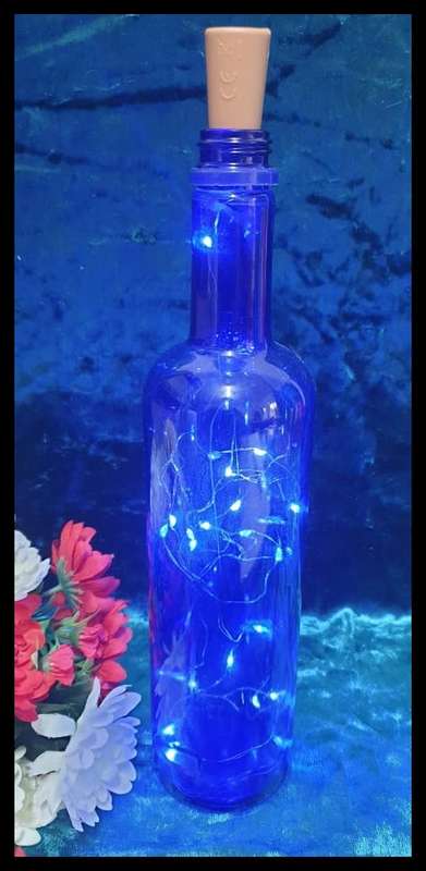 Blue Glass Bottle with Light