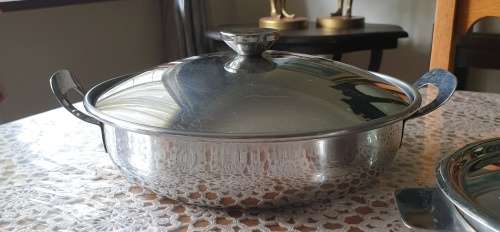 Two Stainless Steel Bowls with Lids