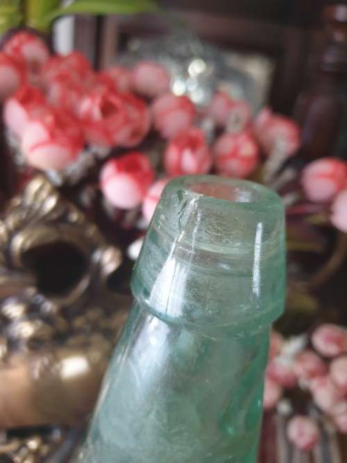 Two Vintage Glass Bottles