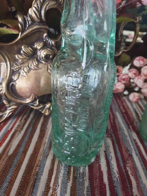 Two Vintage Glass Bottles