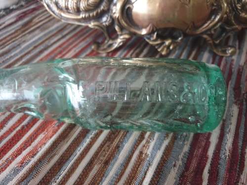 Two Vintage Glass Bottles