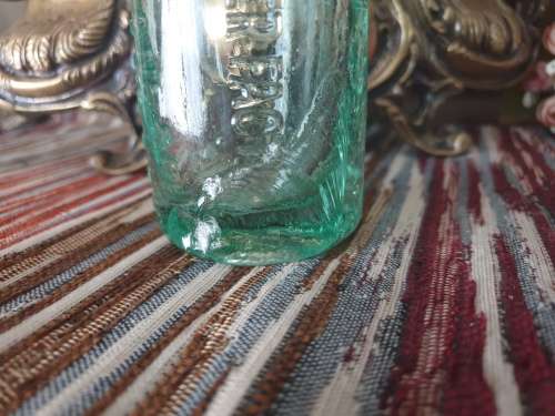 Two Vintage Glass Bottles