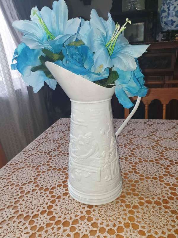 Metal painted Jug with plastic Flowers made in Holland