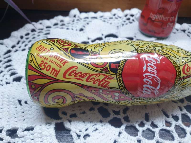 coca-cola customer loyalty bottles
