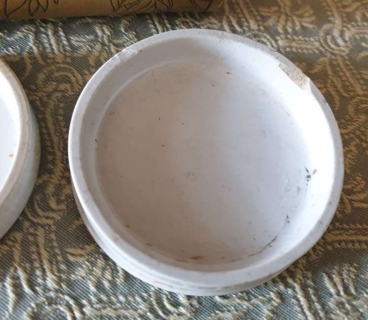 Antique porcelain toothpaste holders |